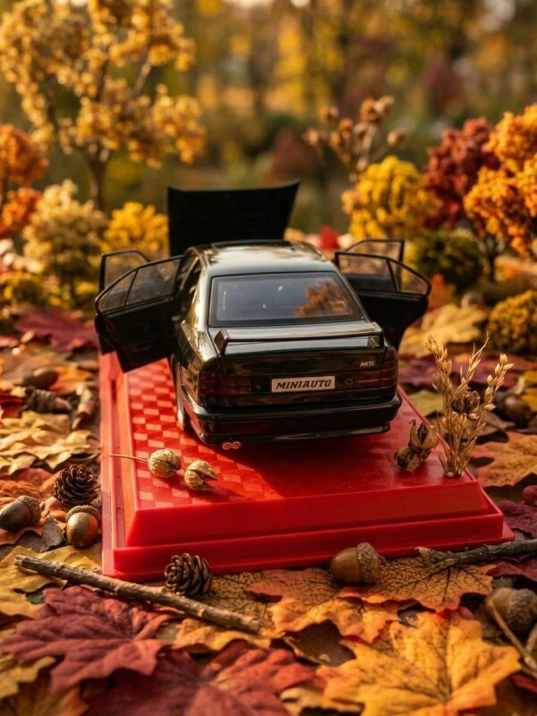 BMW M5 E34 miniature car on a base